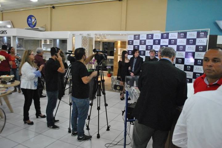 Local press cameras and tripods set up to cover the event